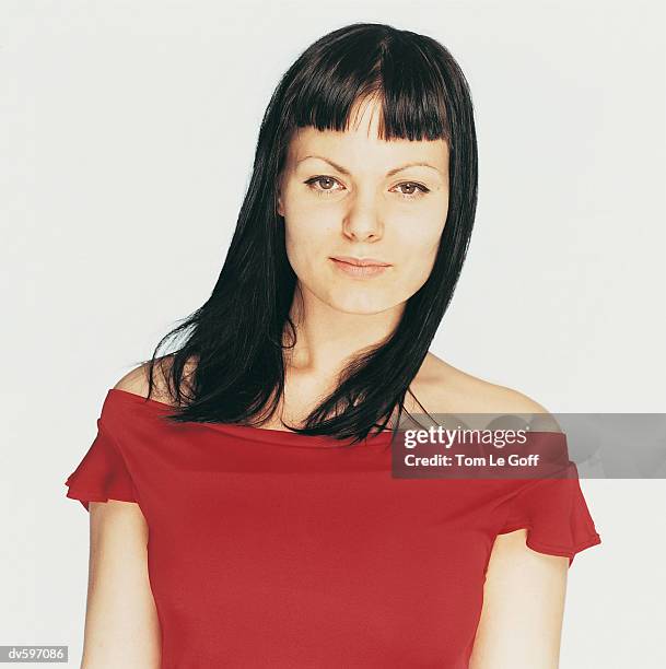 young woman wearing a red shirt - le ストックフォトと画像