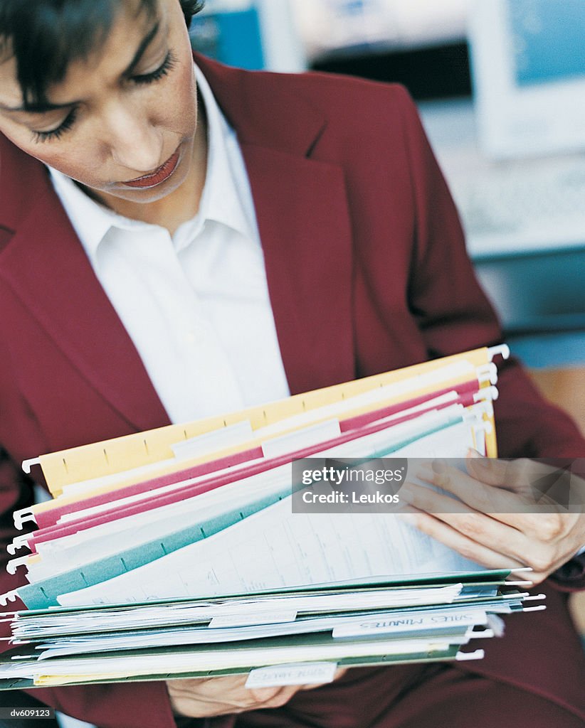 Check File Work Woman Checking File Folders In Office High-Res Stock Photo - Getty Images