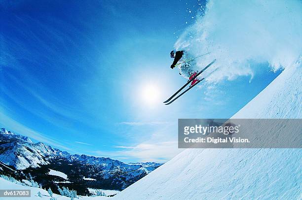 man skiing - wintersport stock-fotos und bilder