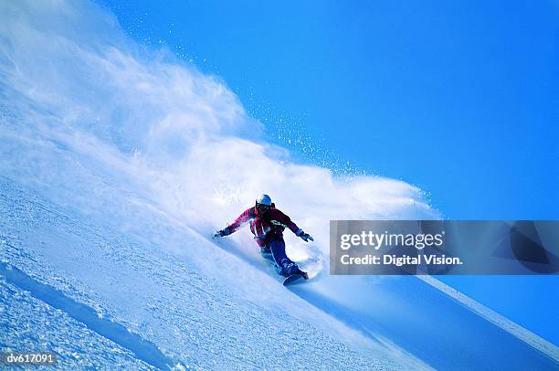 man snowboarding - boarding stock pictures, royalty-free photos & images