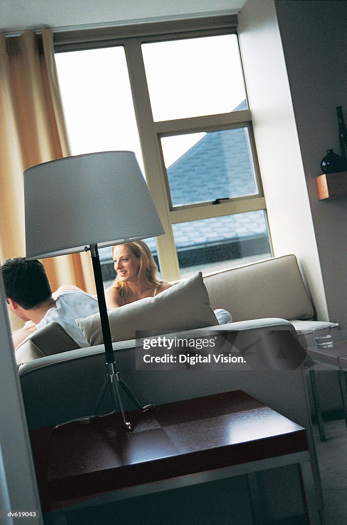 Couple Hanging Out in Living Room