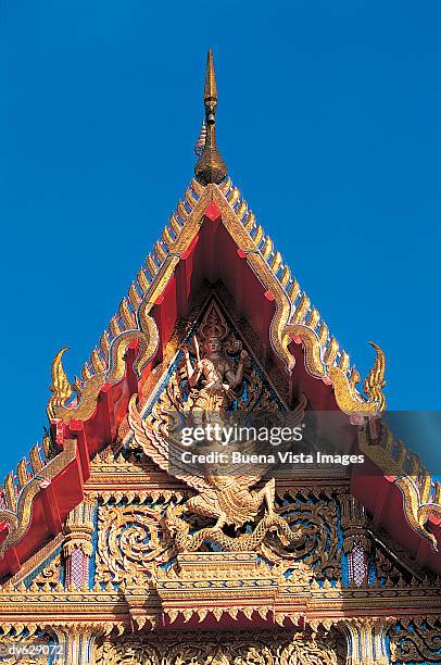 gable roof, temple, wat chalong, phuket, thailand - buena vista stock pictures, royalty-free photos & images
