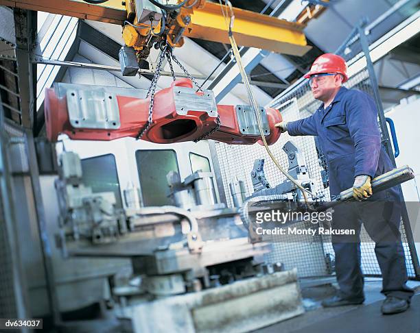 engineer working in factory - monty rakusen stock-fotos und bilder