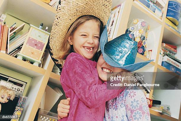 portrait of two girls in fancy dress - daniel stock pictures, royalty-free photos & images