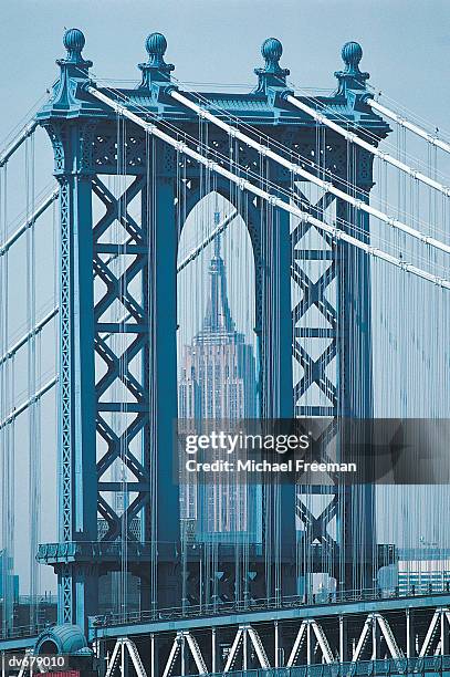 usa, new york city, manhattan bridge and the empire state building - lower midtown manhattan stock pictures, royalty-free photos & images