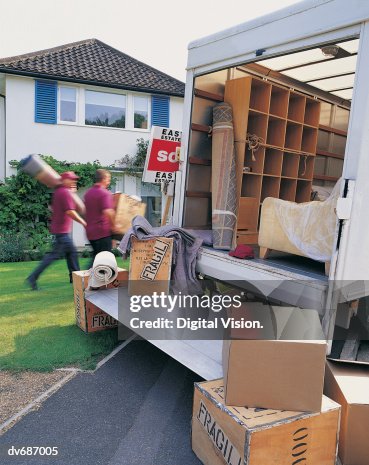 Movers Unloading Moving Van Movers Unloading Moving Van