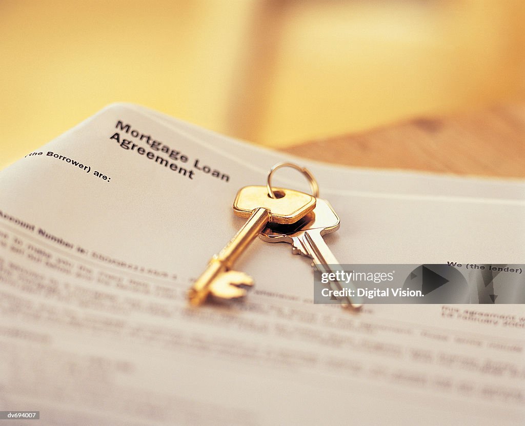 House Keys On Mortgage Agreement