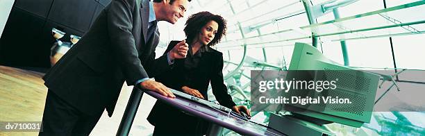 business people using a desktop pc - pc foto e immagini stock