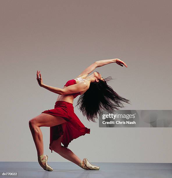 side view of a hispanic ballerina - effortless experience stock pictures, royalty-free photos & images