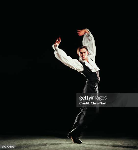 portrait of a male flamenco dancer - flamenco danza tradizionale foto e immagini stock