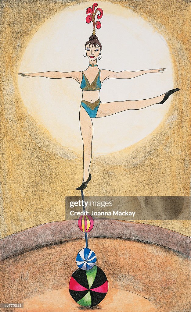 Acrobat Balancing On One Leg on a Stack of Balls