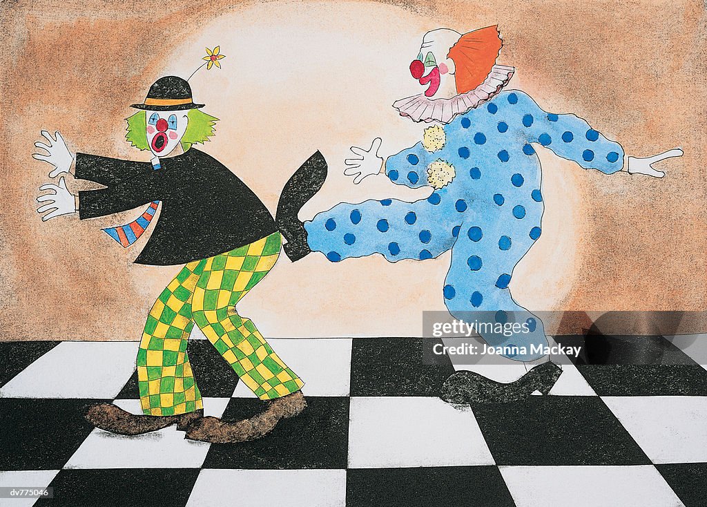 Clown Kicking Another Clown on the Backside