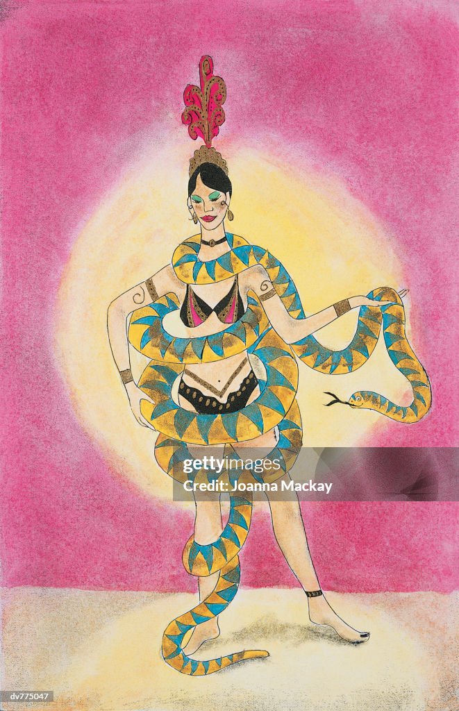 Performer Holding a Snake That is Twisting Around Her