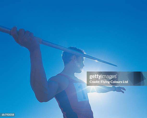 javelin throwing - saut et lancer d'athlétisme masculin photos et images de collection