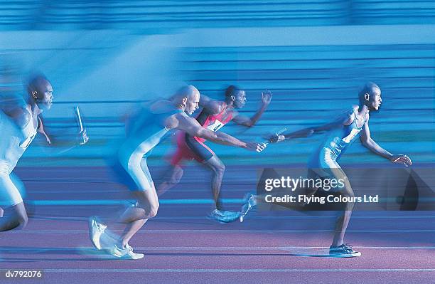 four athletes in a relay race - mitziehen stock-fotos und bilder