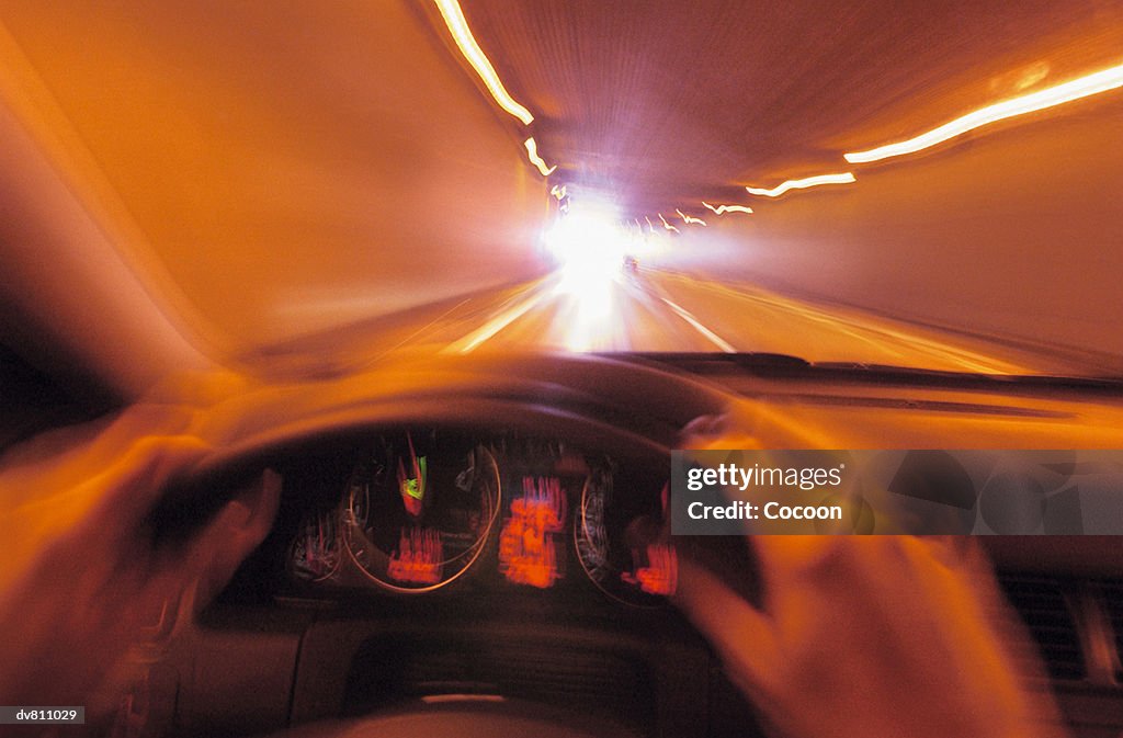 Personal Perspective of a Drunk Driver Travelling Through a Motorway Tunnel at Speed