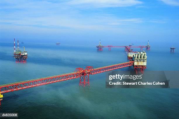 aerial view of an offshore oil rig - stewart stock-fotos und bilder