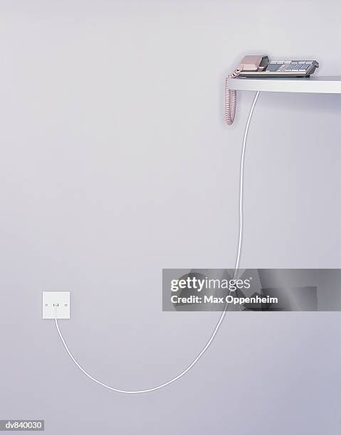 telephone connected to electric socket - max stock pictures, royalty-free photos & images