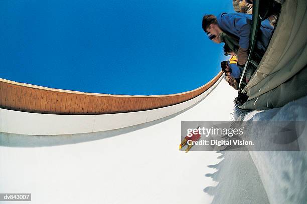 spectators watching luge competition - luge stock pictures, royalty-free photos & images