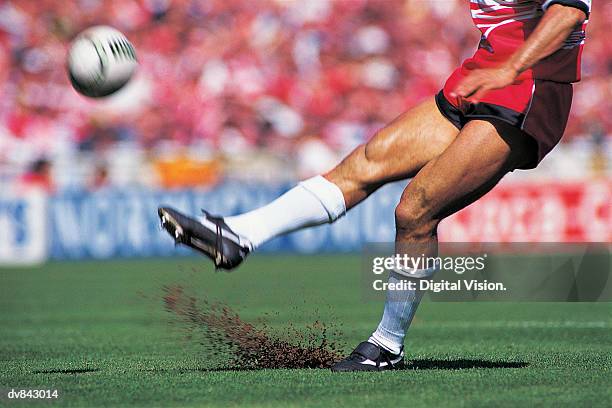 rugby player kicking the ball - rugby kick stock pictures, royalty-free photos & images