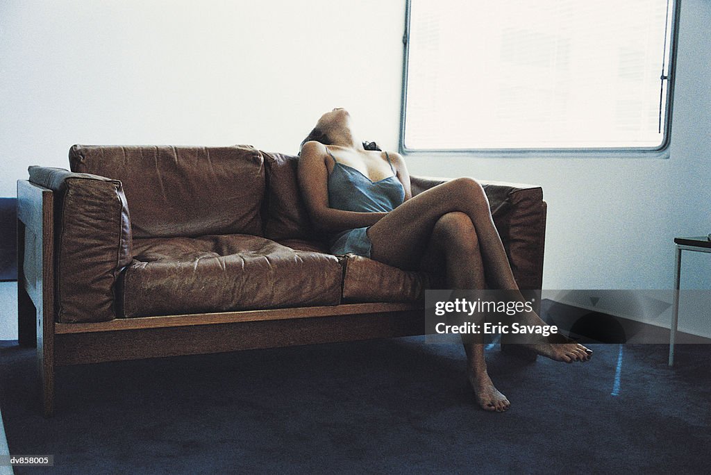 Woman Relaxing on a Sofa