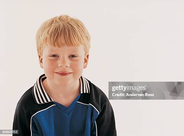 portrait of a primary age boy - andersen ross stockfoto's en -beelden