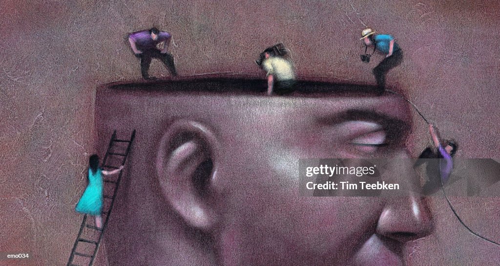 People Looking in Man's Head