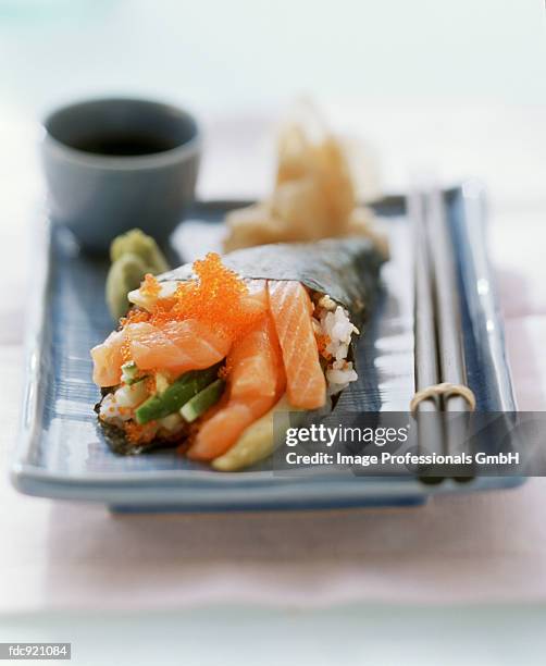 temaki sushi with salmon and caviar - red caviar stock pictures, royalty-free photos & images