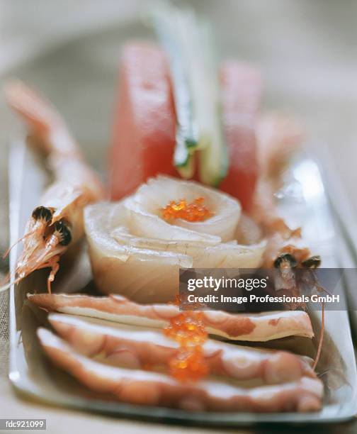 sashimi with salmon caviar - ikura stock pictures, royalty-free photos & images