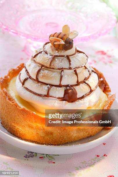 lemon meringue tart with marzipan bee - hymenopteran insect stock pictures, royalty-free photos & images