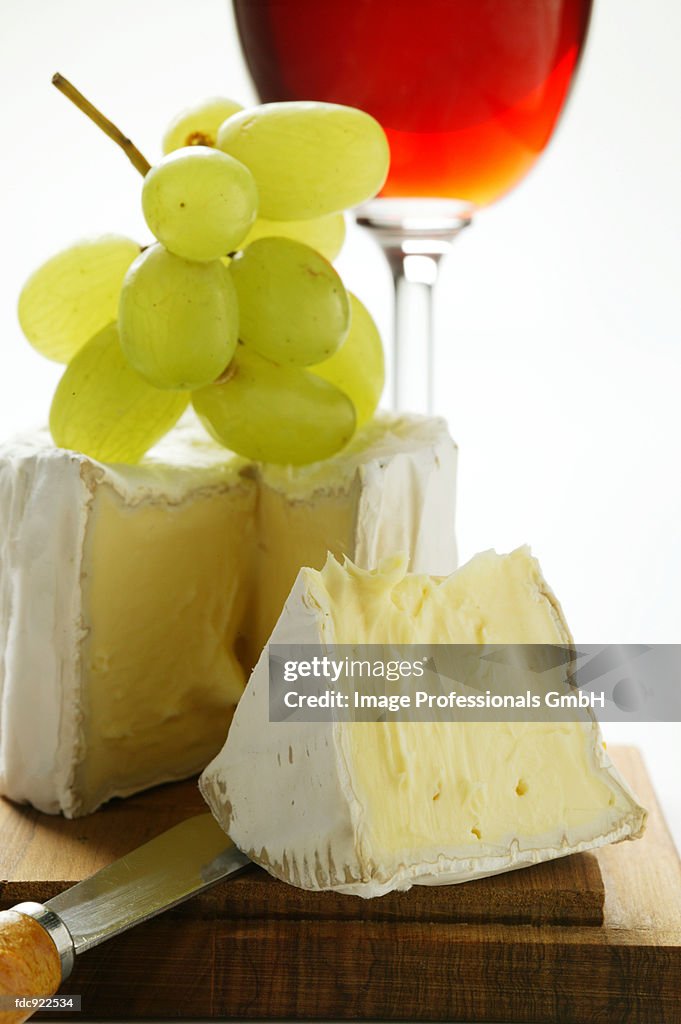 Triple cream cheese with grapes and red wine