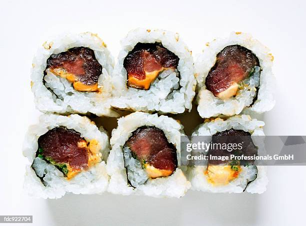 inside-out rolls with tuna - sushi rice stock pictures, royalty-free photos & images