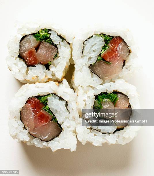 inside-out rolls with fish - sushi rice stock pictures, royalty-free photos & images