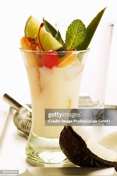 coconut milk cocktail (pina colada) - pina stock pictures, royalty-free photos & images