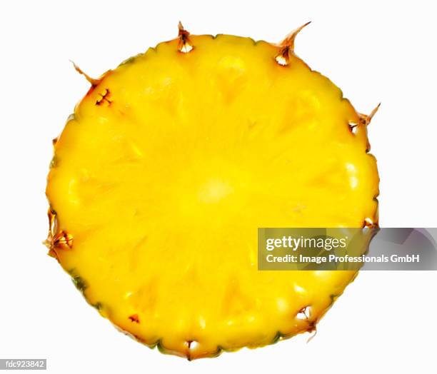 slice of pineapple - pineapple slice stock pictures, royalty-free photos & images