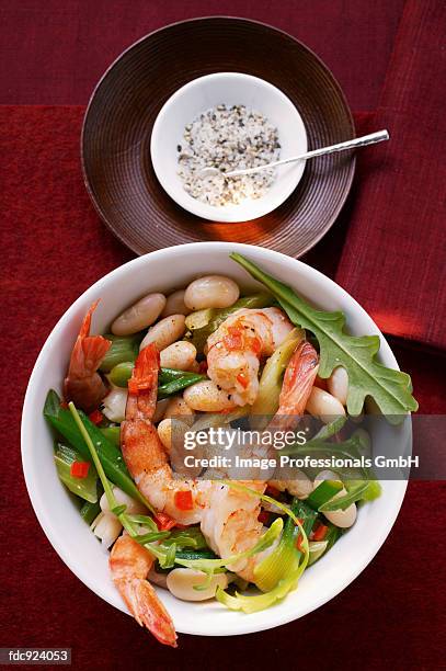 bean stew with shrimps and rocket - vegetable stew stock pictures, royalty-free photos & images