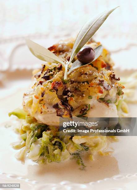 zander fillet with olive crust - ray finned fish stock-fotos und bilder