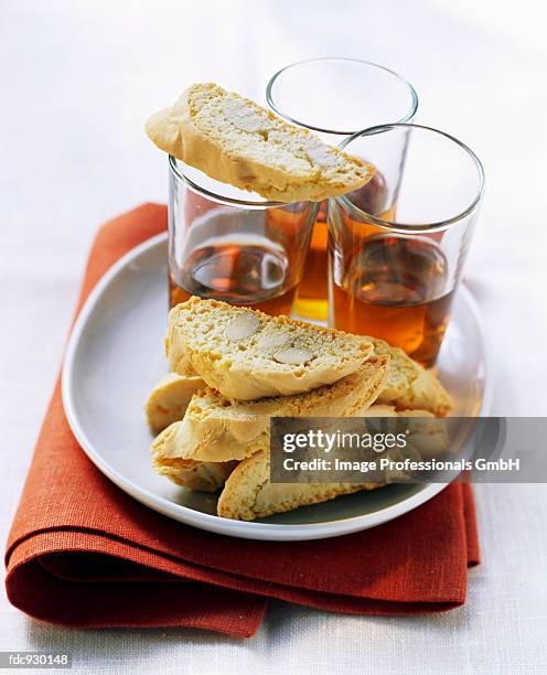 biscotti di prato with vin santo (almond biscuits, italy) - vin stock pictures, royalty-free photos & images