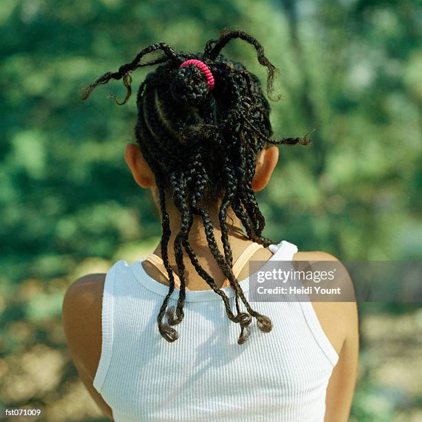 a girl's braided hair from behind - heidi stock-fotos und bilder