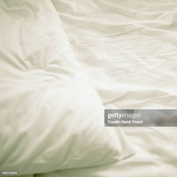 a pillow on a bed - pillow case stock pictures, royalty-free photos & images