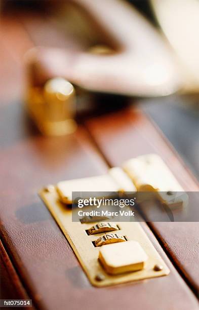 a lock on a briefcase - marc stock pictures, royalty-free photos & images