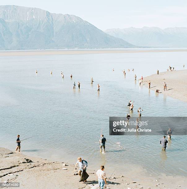 fishermen wading in water, alaska, usa - julia an stock pictures, royalty-free photos & images