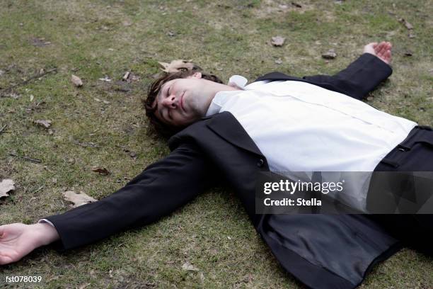 He Lay Arms Raised Lying On Back Horizontal Side View Photos and Premium High ...
