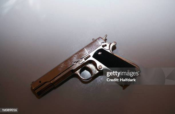 close-up of a revolver - handgun stock pictures, royalty-free photos & images