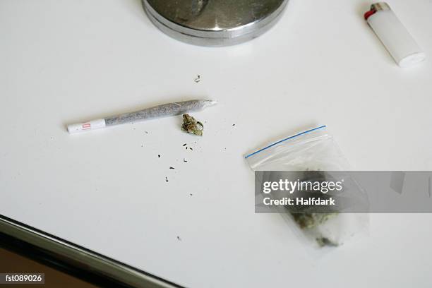 marijuana, joint, and lighter - aschenbecher stock-fotos und bilder