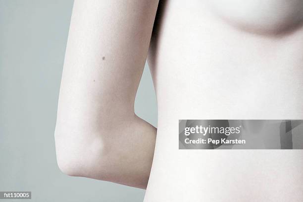 close-up of woman?s torso - hinge joint stock pictures, royalty-free photos & images