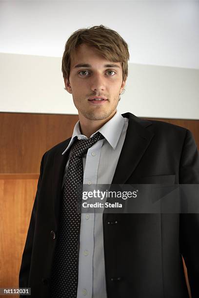 man with crooked tie - stella stock pictures, royalty-free photos & images