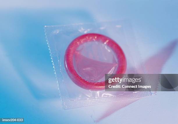 Condom 7,393 Condom Use Stock Photos, High-Res Pictures, and Images - Getty Images