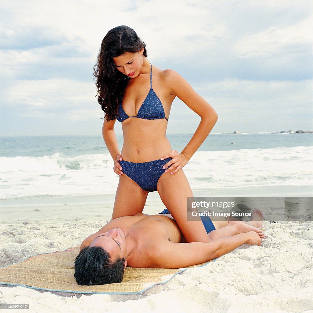 Romantic Man And Woman On Beach High-Res Stock Photo - Getty Images
