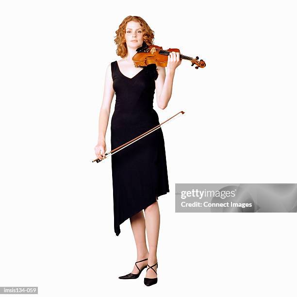 female violinist - violinist stock pictures, royalty-free photos & images